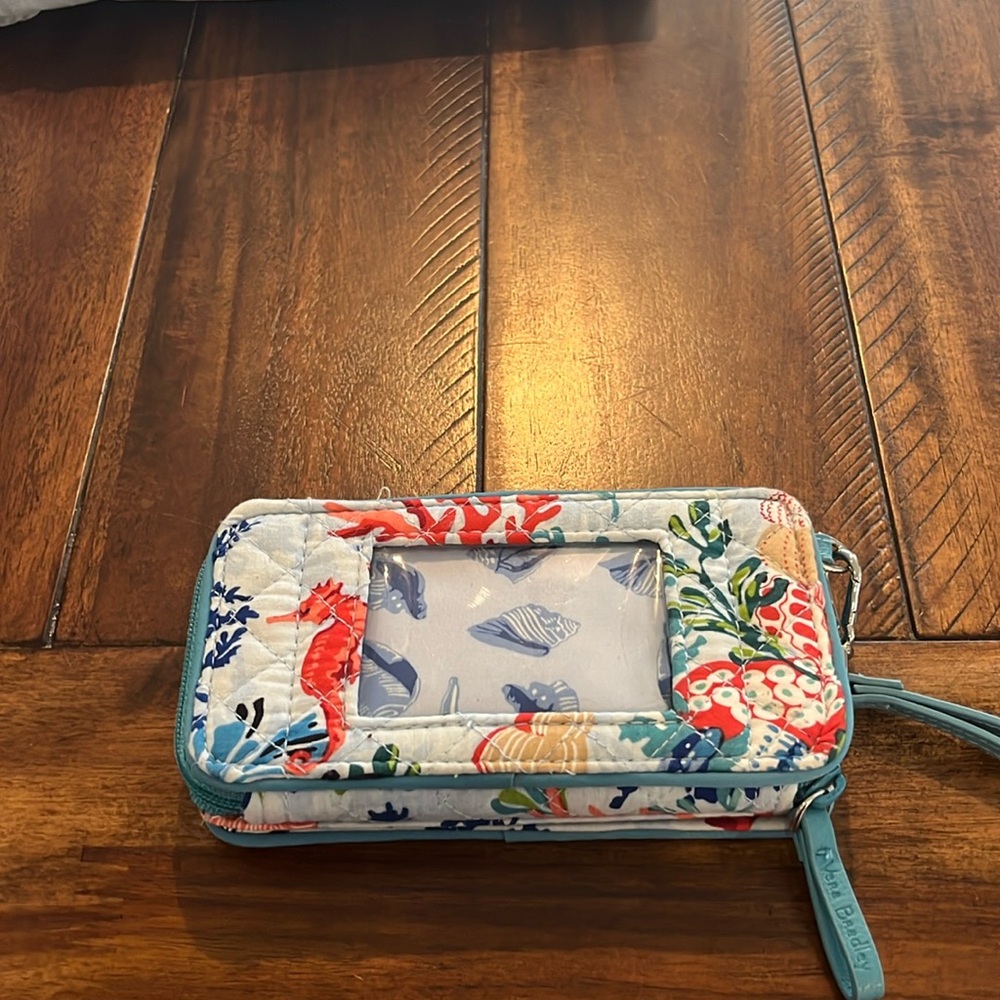 Vera Bradley super cute little wristlet wallet fits a lot. Super cute colors